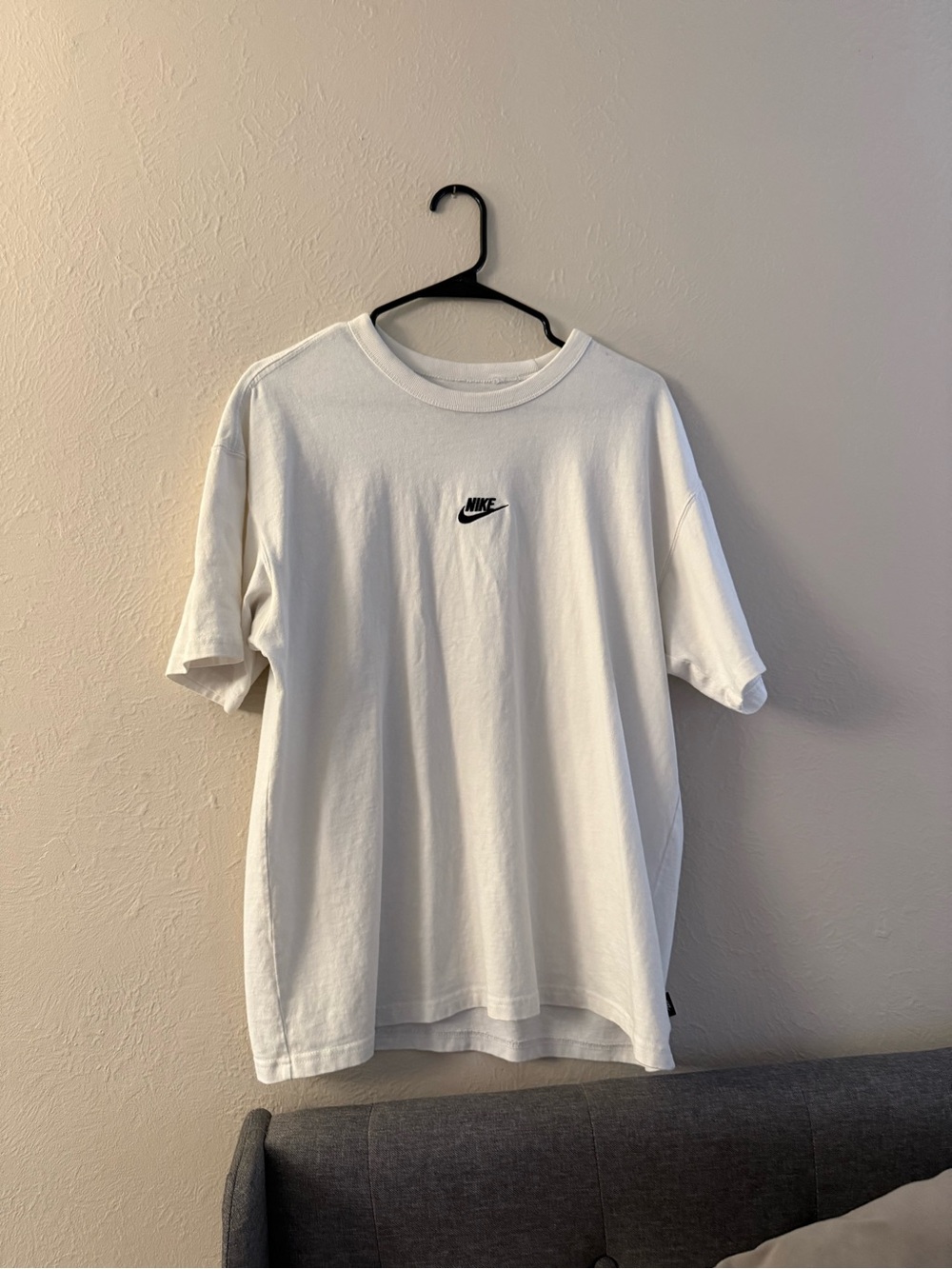 Nike White Short-Sleeve T-Shirt with Black Swoosh Logo